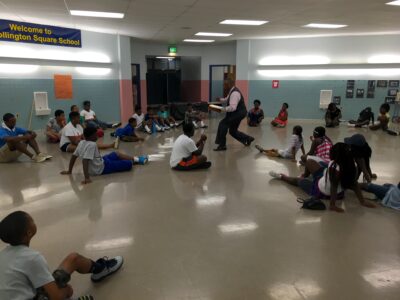 Humanim Board Member Eric Booker Reads to Elev8 Students